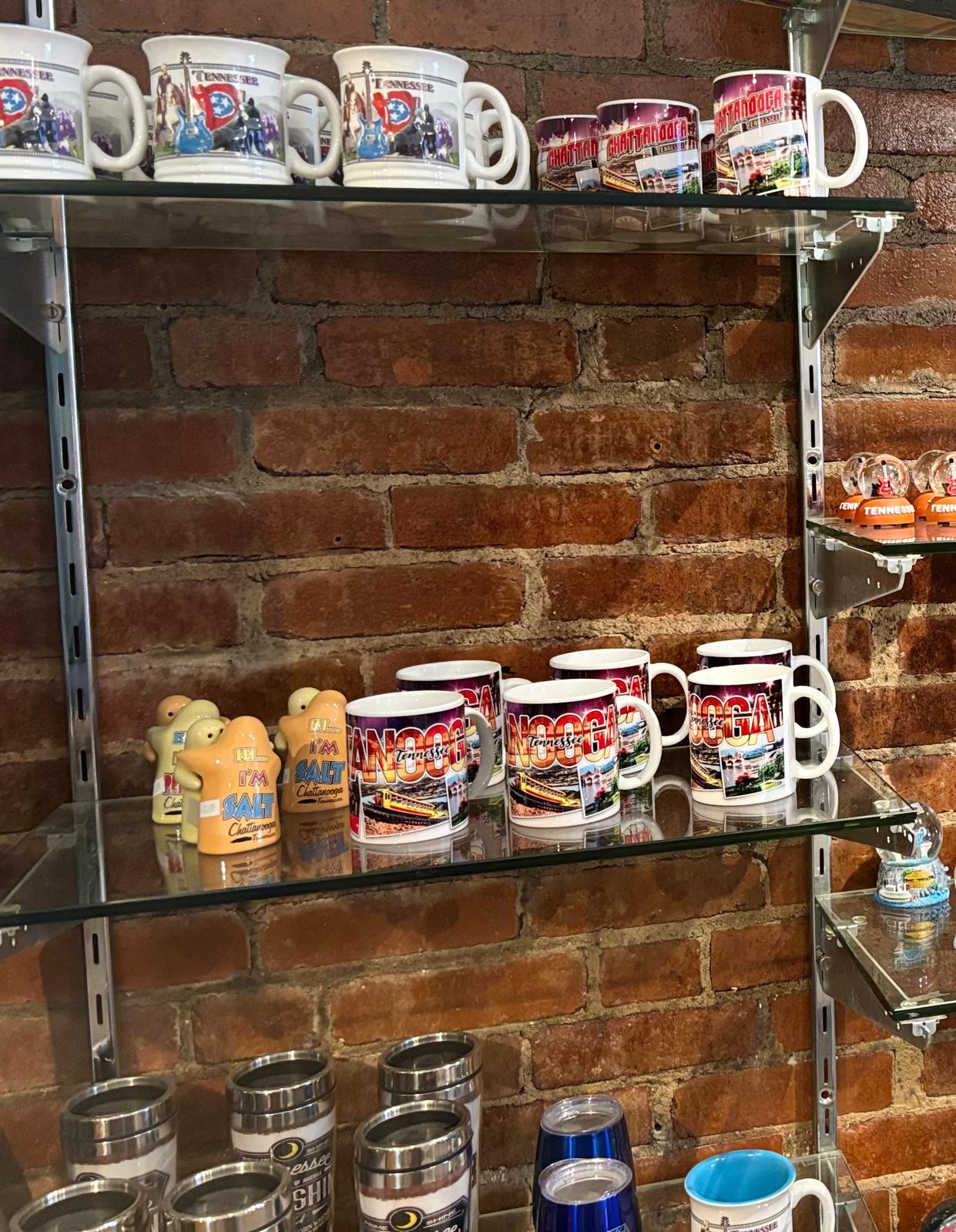 Drinkware on glass shelf